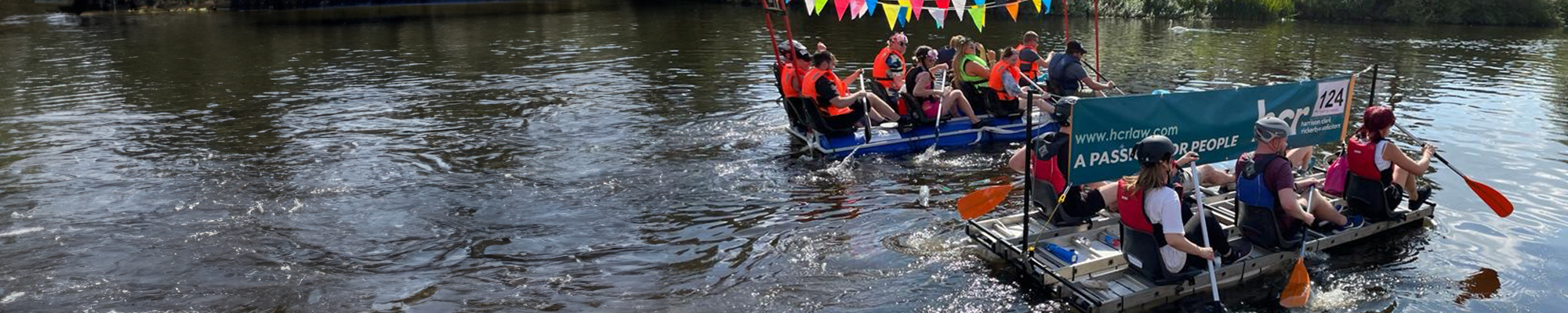 Member of the Wye Valley team taking part in a raft race