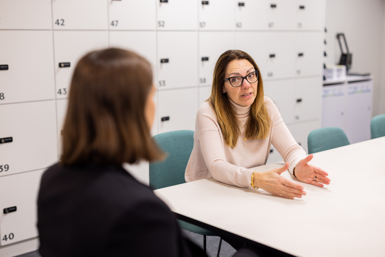 A client and a lawyer having a serious conversation