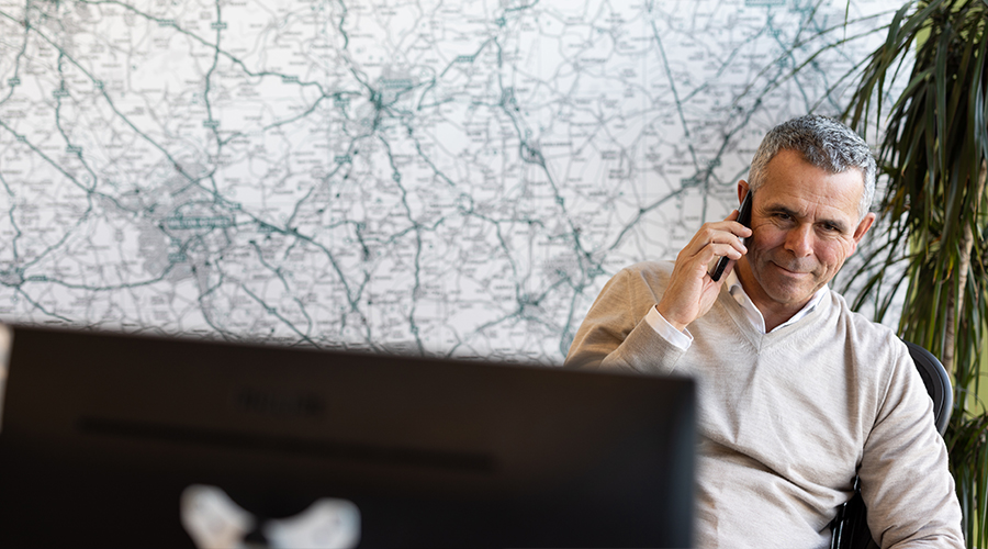 A debt recovery lawyer on a phone call in Northampton