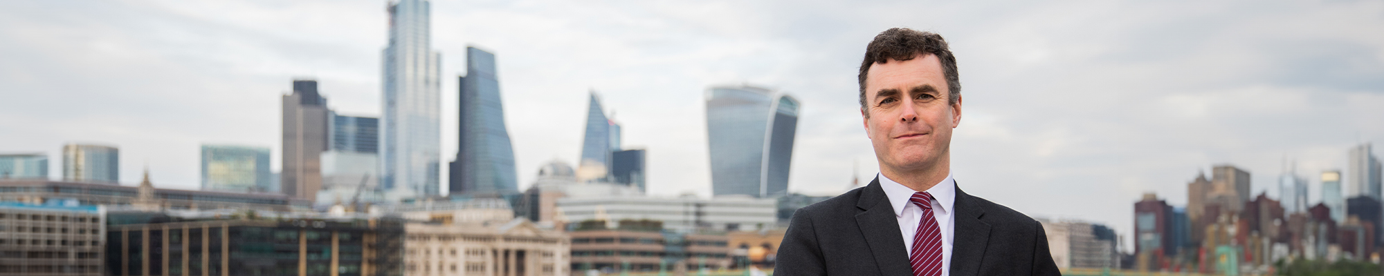 Nicolas Groffman standing alongside the london skyline
