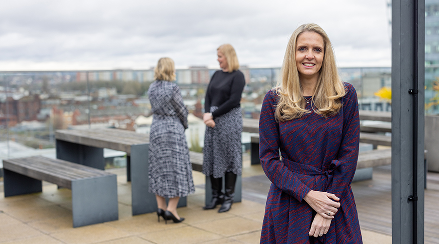 Healthcare Professionals standing on the roof of HCR's Birmingham Office