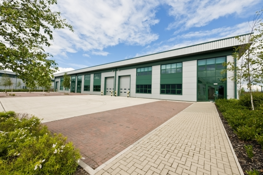 Warehouse building with green windows