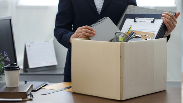 Photo of employee filling box after being fired