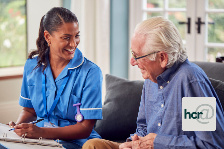 photo of a carer with a retired man
