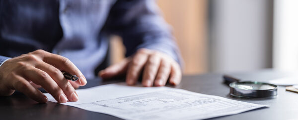 Man signing a document