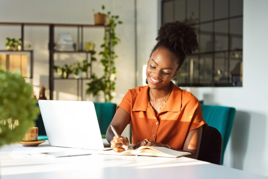 A woman sat at a computer