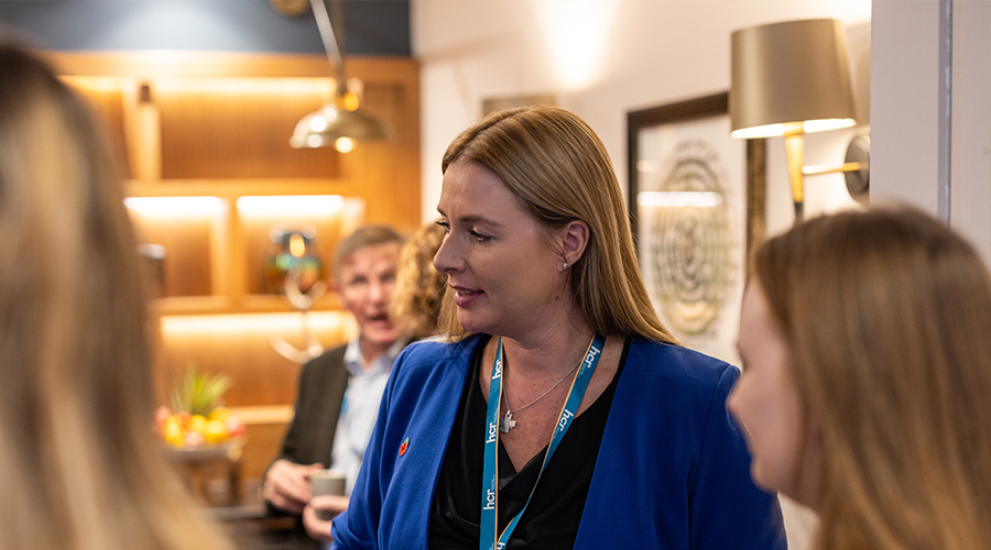 Female Partner at a networking event