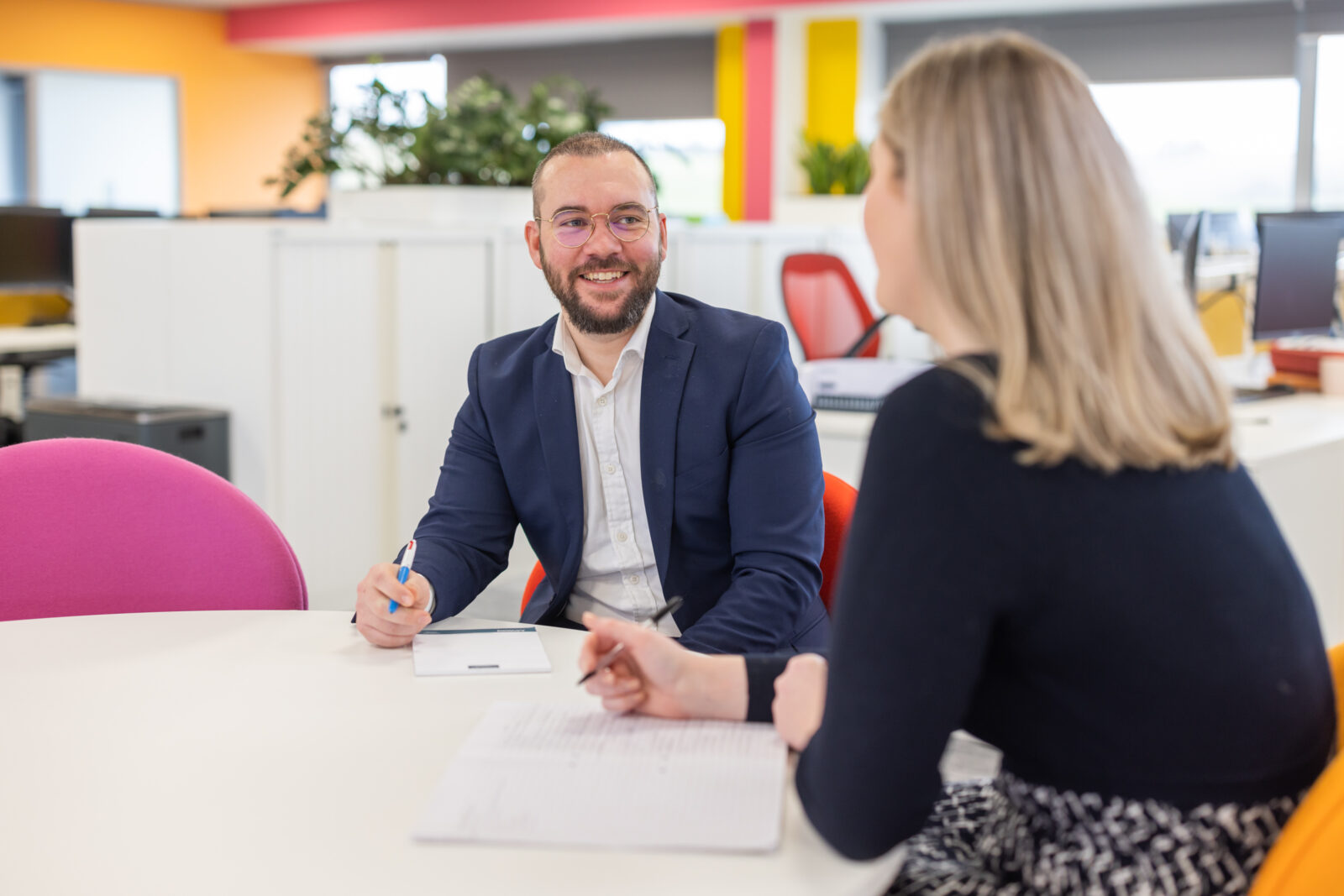 Photo of two lawyers chatting