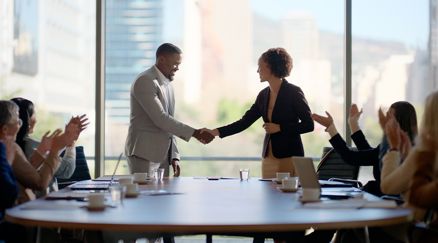 Two clients shaking hands