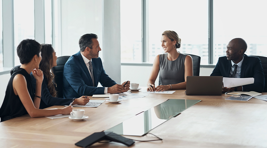 People sat at a meeting