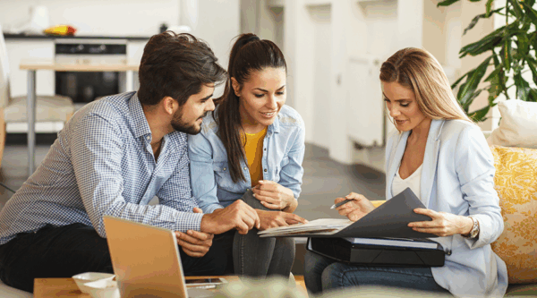 Couple talking to lawyer about real estate finance