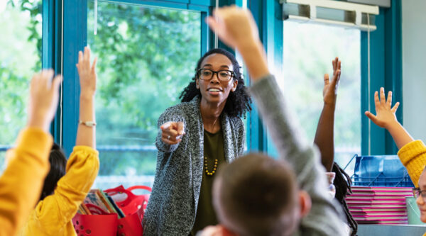 A school teacher with her pupils