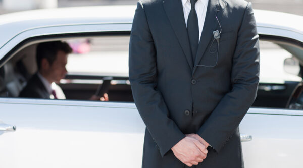 A picture of a bodyguard providing security