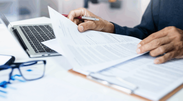 A person checking papers