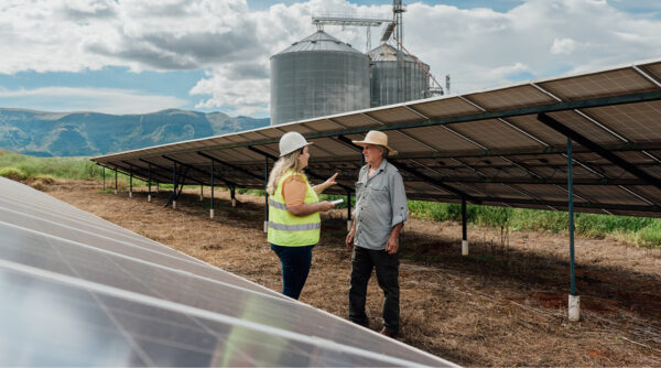 A farmer and a planner discussing something