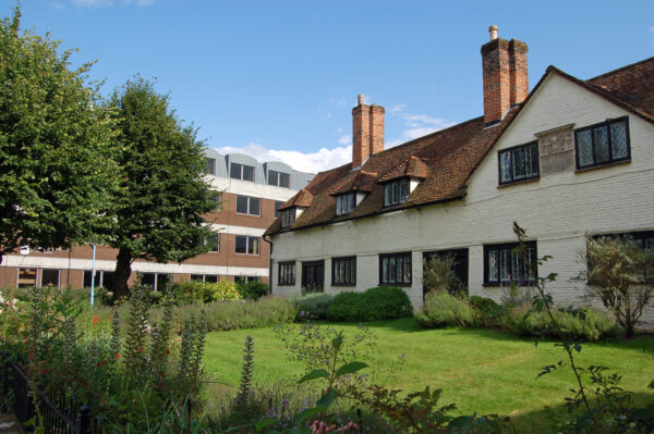 A picture showing the gardens of several almshouses