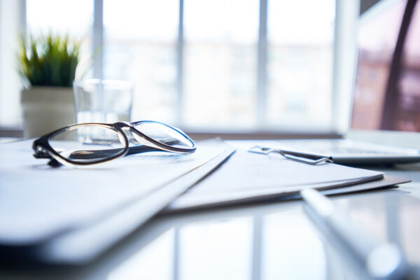 Eye-glasses on the table