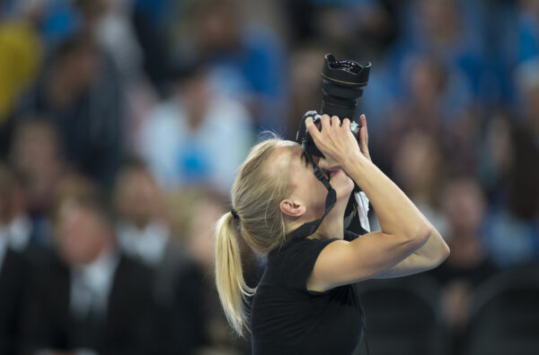 A photographer at a sporting event