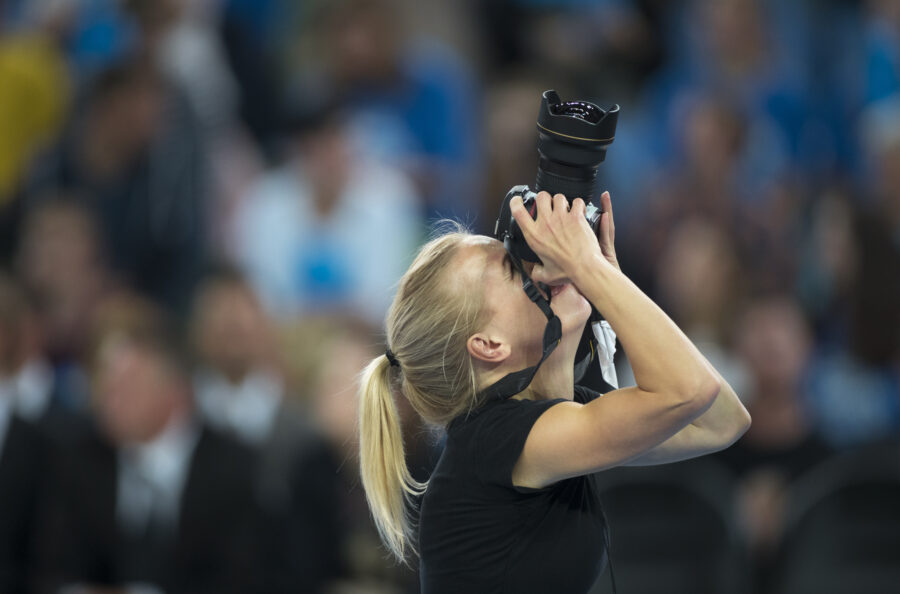 A photographer at a sporting event