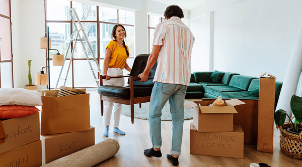 A couple moving into a property