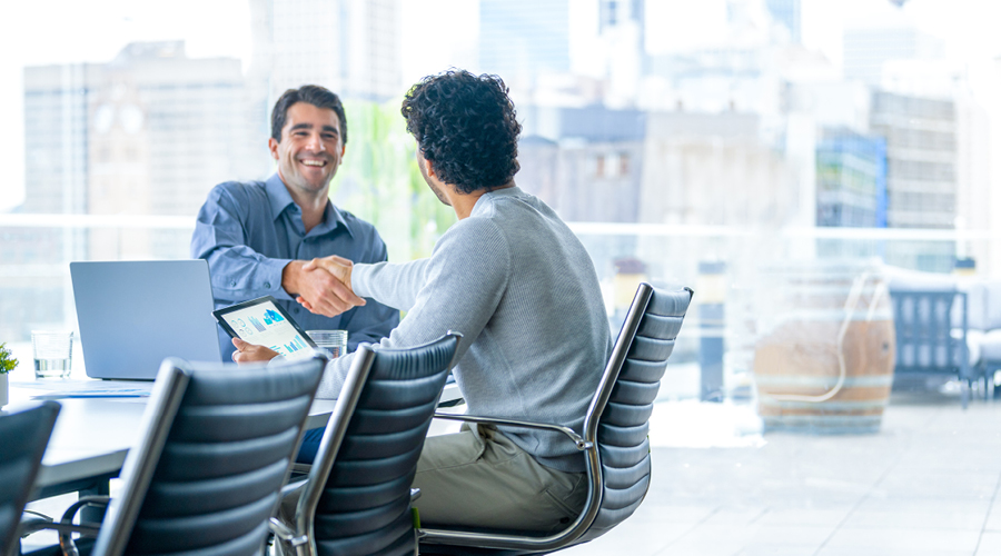 Two business people discussing