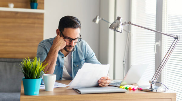 A man reading a document