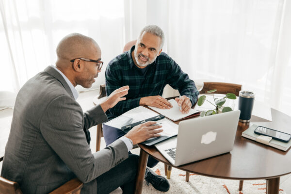 A lawyer and a man working out their estate planning