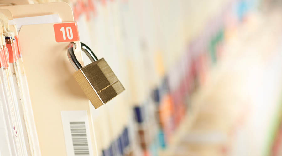 A medical record with a padlock