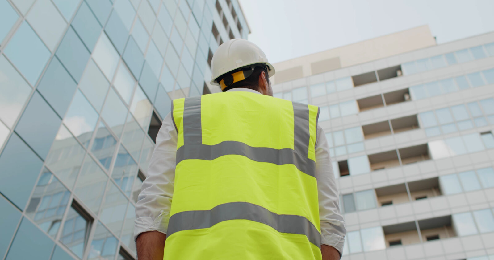 A construction worker in a high visibility vest