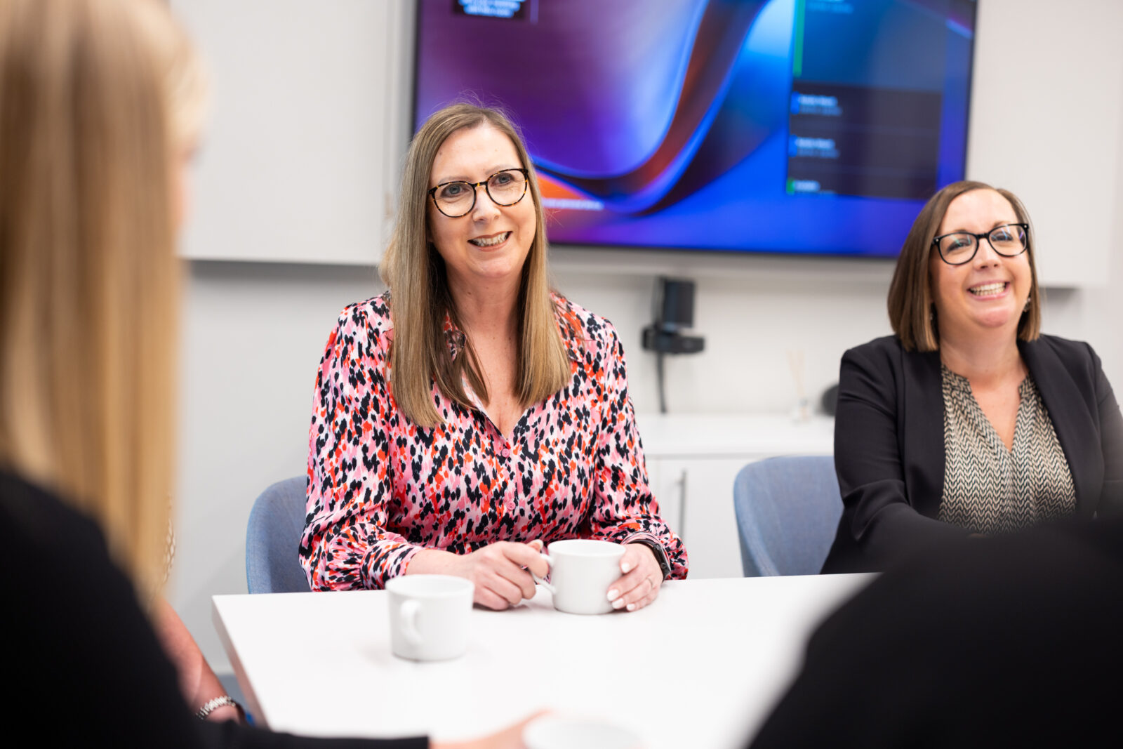 Residential property solicitors having a meeting