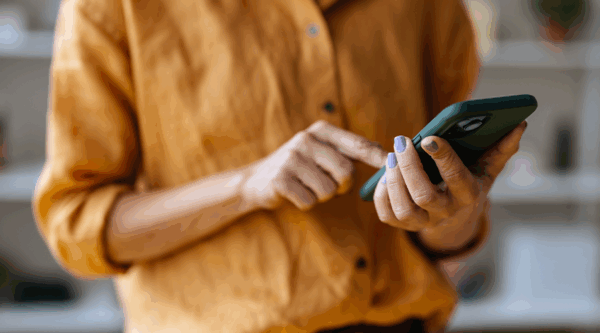 An influencer checking their phone
