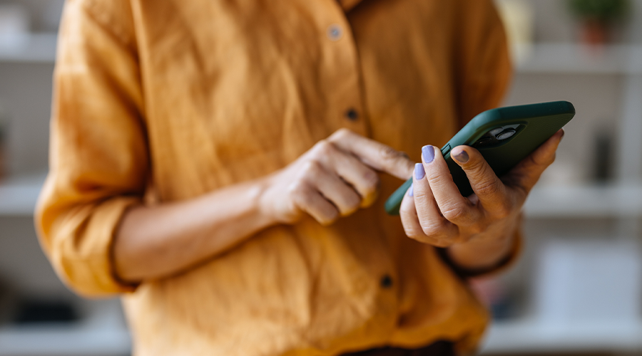 An influencer checking their phone