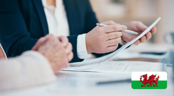 A person checking a document for their liability