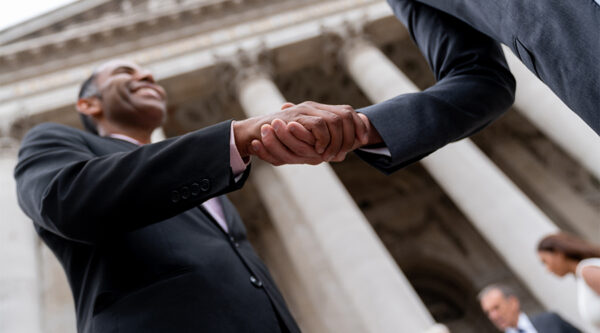 Two businessmen shaking hands