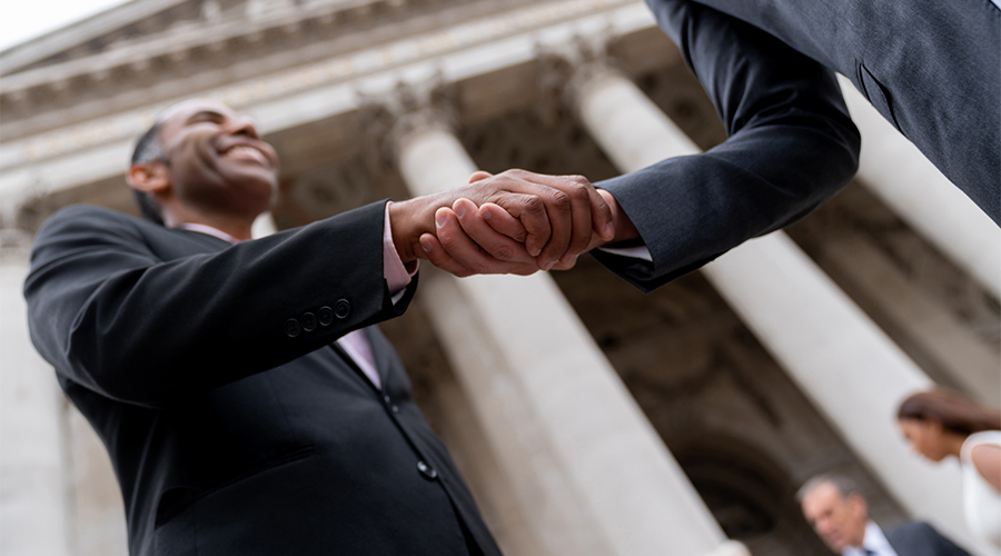 Two businessmen shaking hands