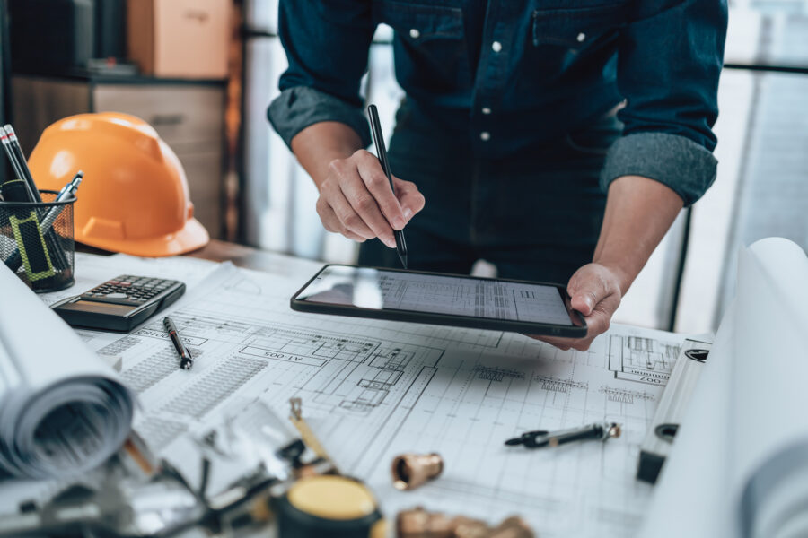 An Architect using an AI programme for their drafting