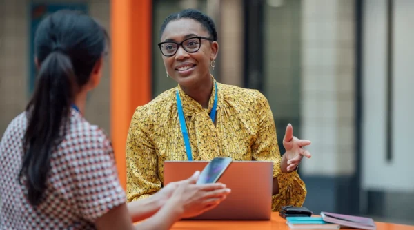 Two teachers discussing something