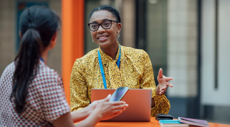 Two teachers discussing something