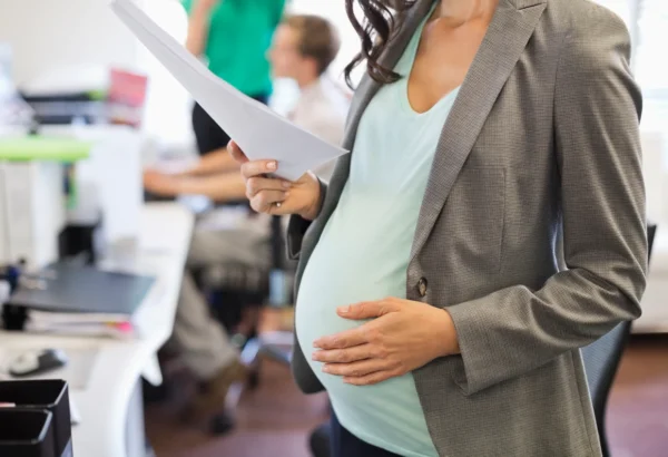 An image of a pregnant employee