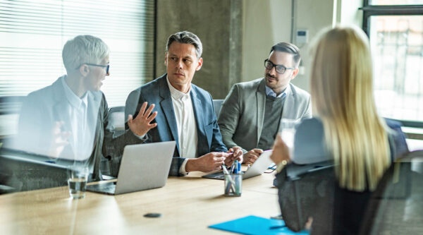 Business people discussing a petition