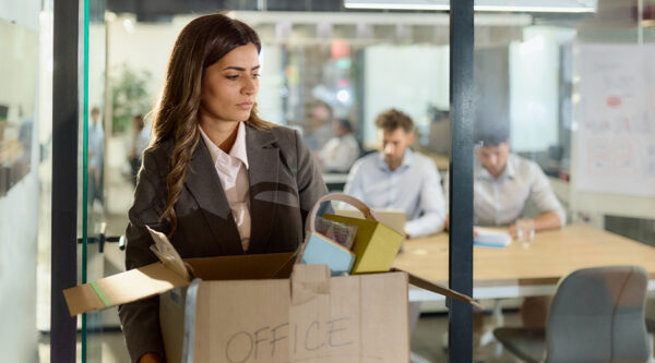 An employee packing their box