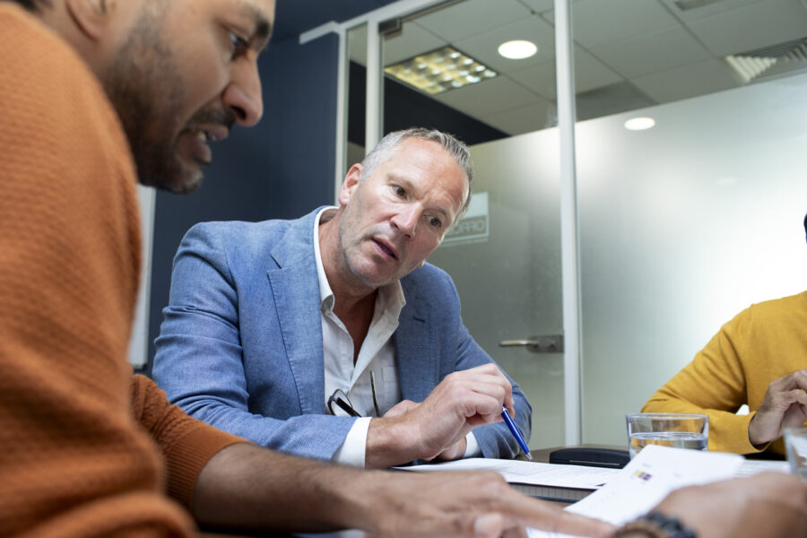 Clients reviewing a conditional fee arrangement