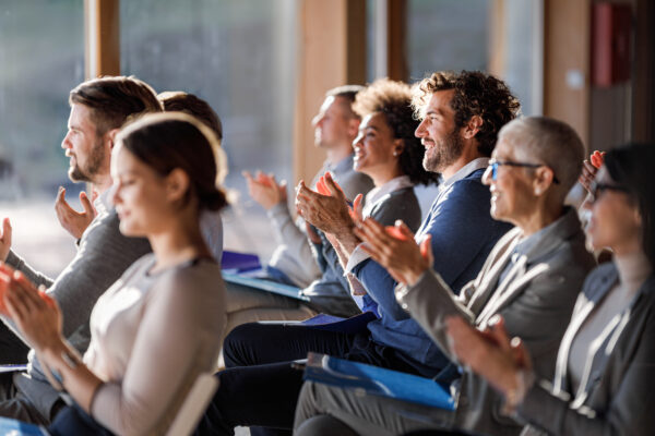 A conference room filled with peope