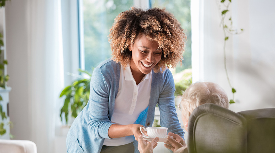 A care worker with a resident