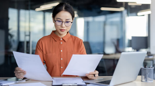 Female looking over documents