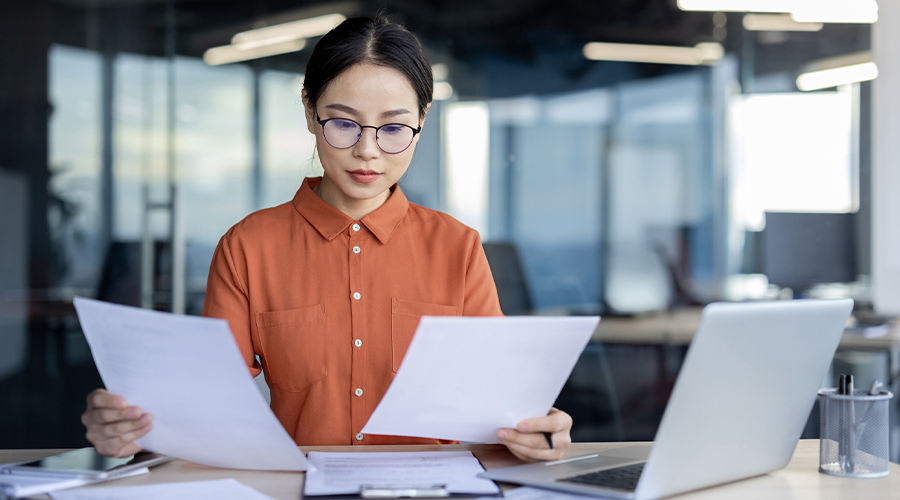 Female looking over documents