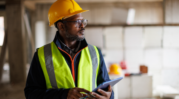 Builder wearing protective gear
