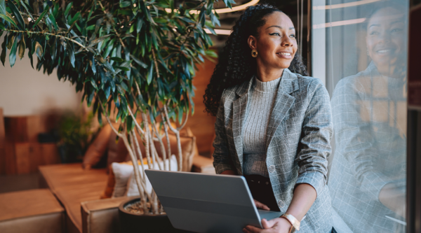Woman working on laptop in a office