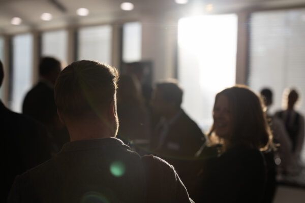 People networking at a cyber and technology event