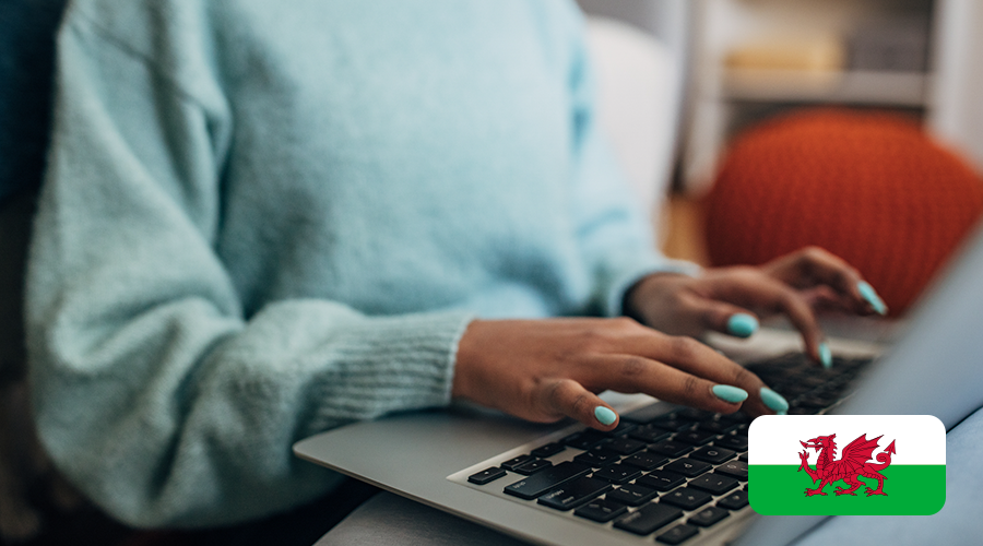 Female typing on a laptop